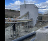 Rod Mill Feed Bin Conveyor from crusher building to ore bin - 1,312 ft x 30 in.