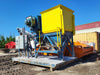TEAM MIXING TECHNOLOGIES INC. Skid-Mounted Bulk Material Hopper & Variable Speed Screw Conveyor Feed System