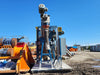 TEAM MIXING TECHNOLOGIES INC. Skid-Mounted Bulk Material Hopper & Variable Speed Screw Conveyor Feed System