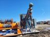 TEAM MIXING TECHNOLOGIES INC. Skid-Mounted Bulk Material Hopper & Variable Speed Screw Conveyor Feed System