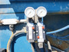 TEAM MIXING TECHNOLOGIES INC. Skid-Mounted Bulk Material Hopper & Variable Speed Screw Conveyor Feed System