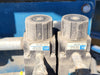 TEAM MIXING TECHNOLOGIES INC. Skid-Mounted Bulk Material Hopper & Variable Speed Screw Conveyor Feed System