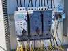 TEAM MIXING TECHNOLOGIES INC. Skid-Mounted Bulk Material Hopper & Variable Speed Screw Conveyor Feed System