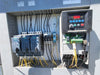 TEAM MIXING TECHNOLOGIES INC. Skid-Mounted Bulk Material Hopper & Variable Speed Screw Conveyor Feed System