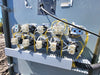 TEAM MIXING TECHNOLOGIES INC. Skid-Mounted Bulk Material Hopper & Variable Speed Screw Conveyor Feed System
