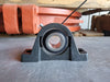 KML Pillow Block Housing w/ UC207-20 Bearing